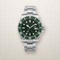 Steel diver automatic watch with green dial and bezel